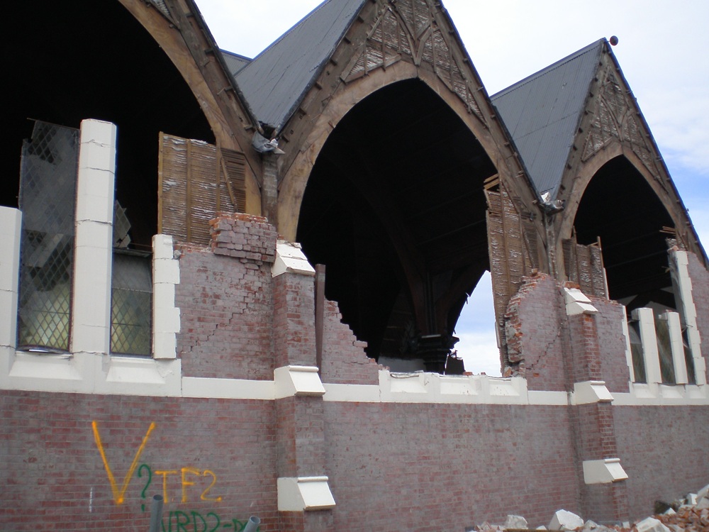 A picture containing building, outdoor, arch, stoneDescription automatically generated